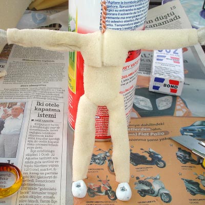 cover wire armature with foam using spray glue